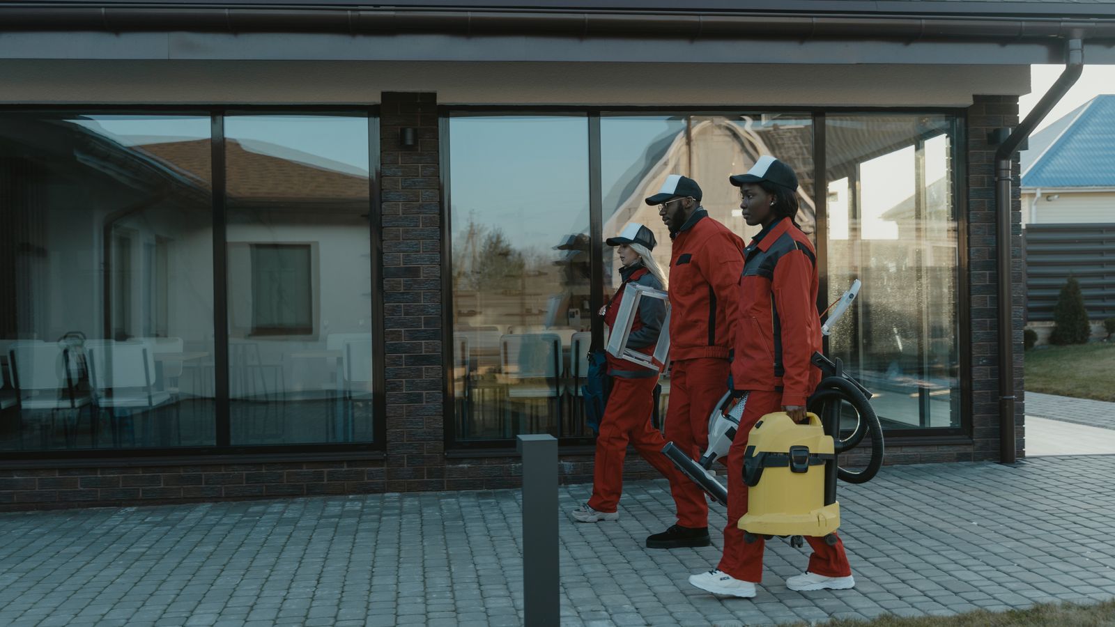 Professional cleaner arriving with suitable cleaning equipment
