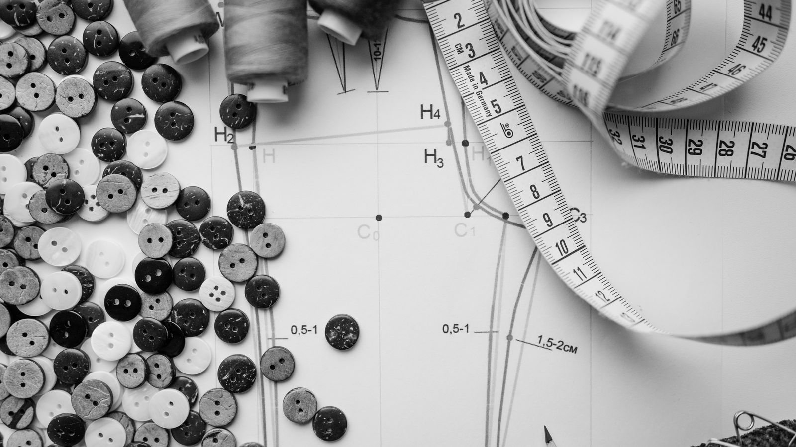Sewing materials and pattern pieces laid out for a repair