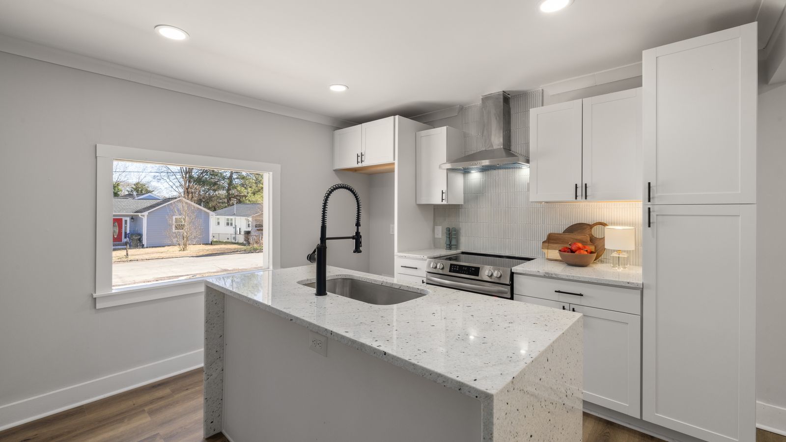 Bright renovated interior with finished wood flooring